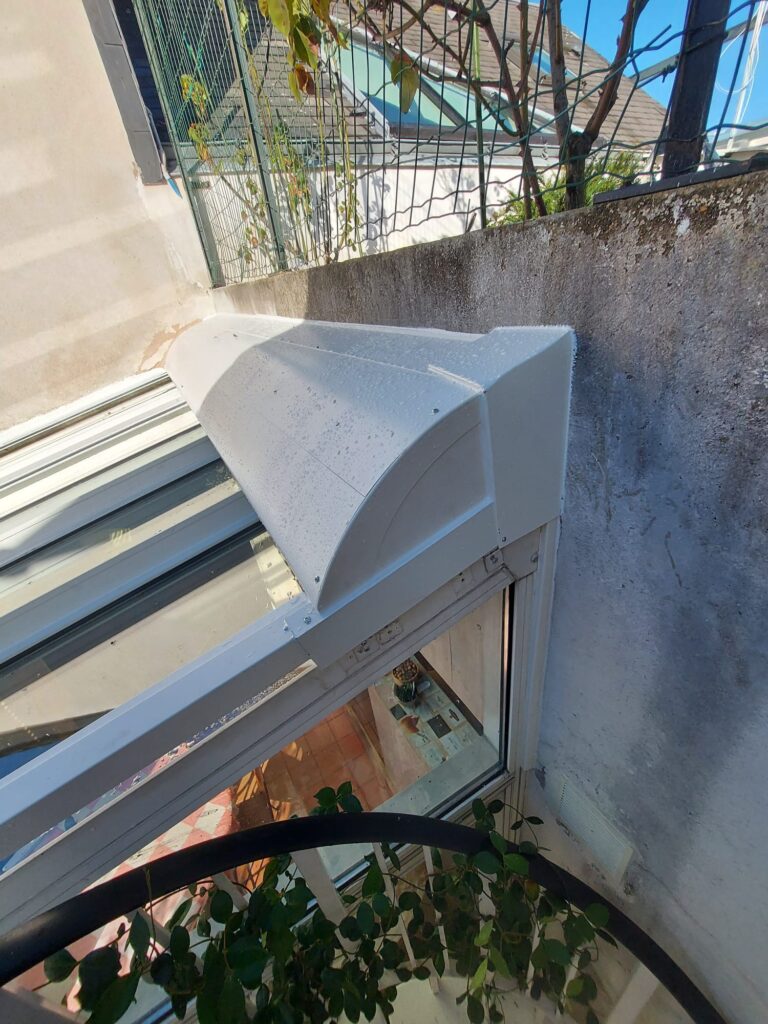 Boulogne (92) Volet de toit ROLAX BUBENDORFF sur veranda  (2)